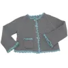 cardigan à bordures festonnées