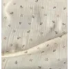 Double gaze de coton organique imprimée  fond écru, imprimé petites baies camel et gris